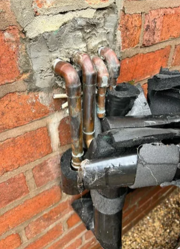 Unsealed joints and missing sleeves allow water to soak into the insulation.